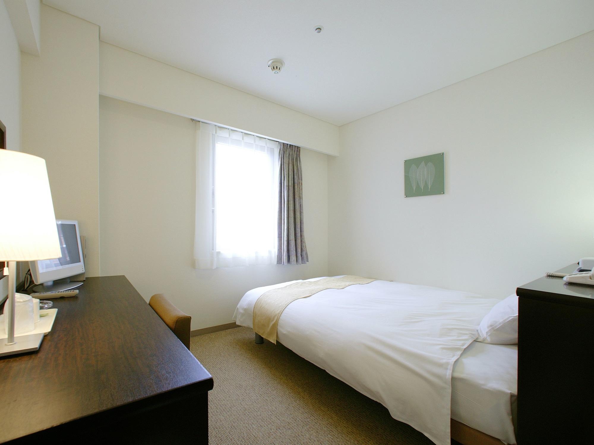 Nest Hotel Kumamoto Rum bild