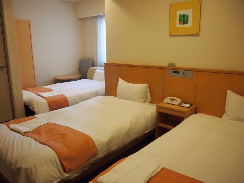 Nest Hotel Kumamoto Rum bild