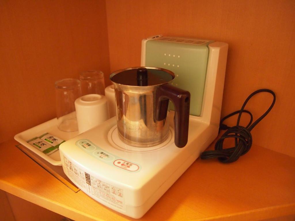 Nest Hotel Kumamoto Rum bild